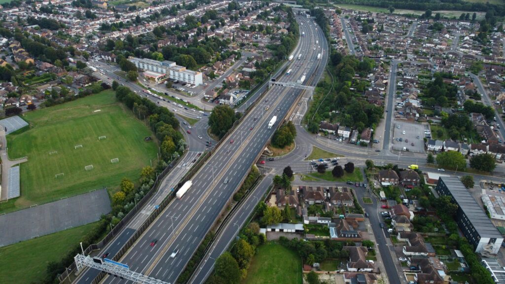 Aerial view of Luton, England showing roads, intersections, and urban development.
